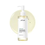 Anua Heartleaf Pore Control Cleansing Oil 200ml bottle on oil texture background – Korean facial cleansing oil for deep pore cleansing and makeup removal