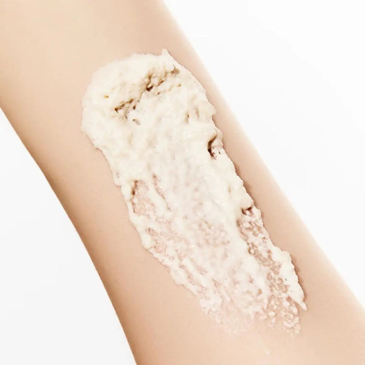 Anua Rice Enzyme Brightening Cleansing Powder creamy foam texture shown on skin – gentle exfoliation and brightening cleanser