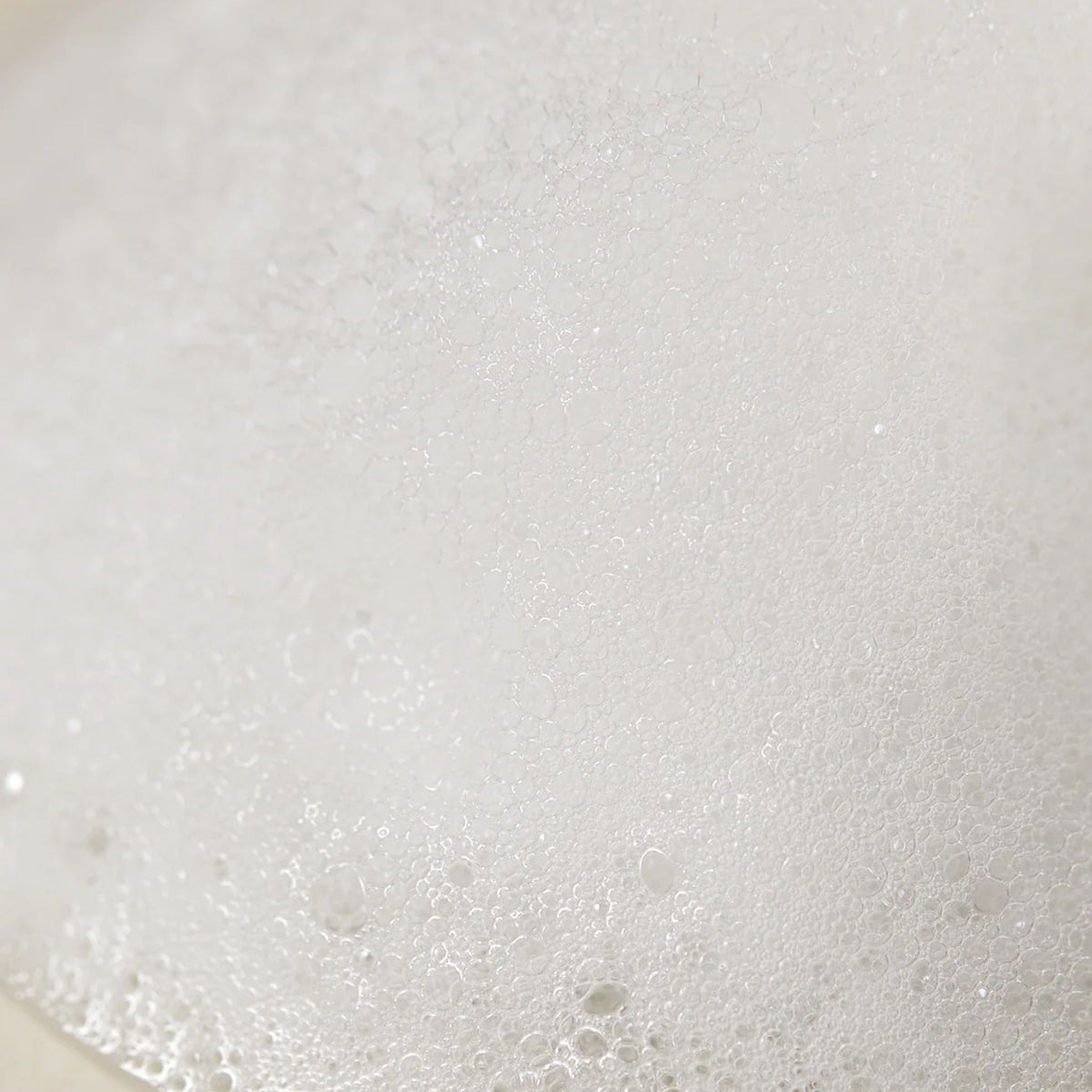Foamy lather texture of AXIS-Y Sunday Morning Refreshing Cleansing Foam – creamy micro-bubbles for deep yet gentle cleansing