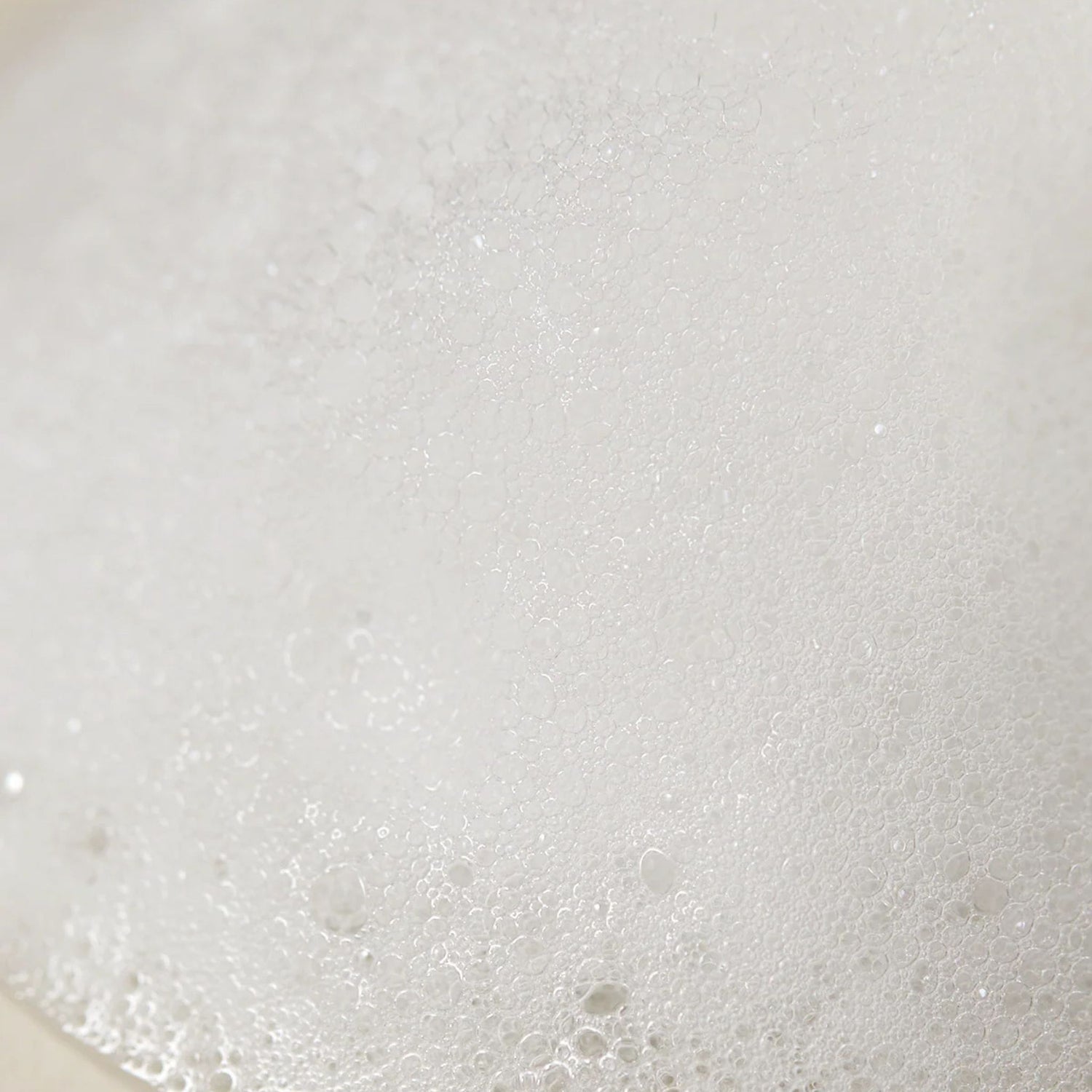 Foamy lather texture of AXIS-Y Sunday Morning Refreshing Cleansing Foam – creamy micro-bubbles for deep yet gentle cleansing