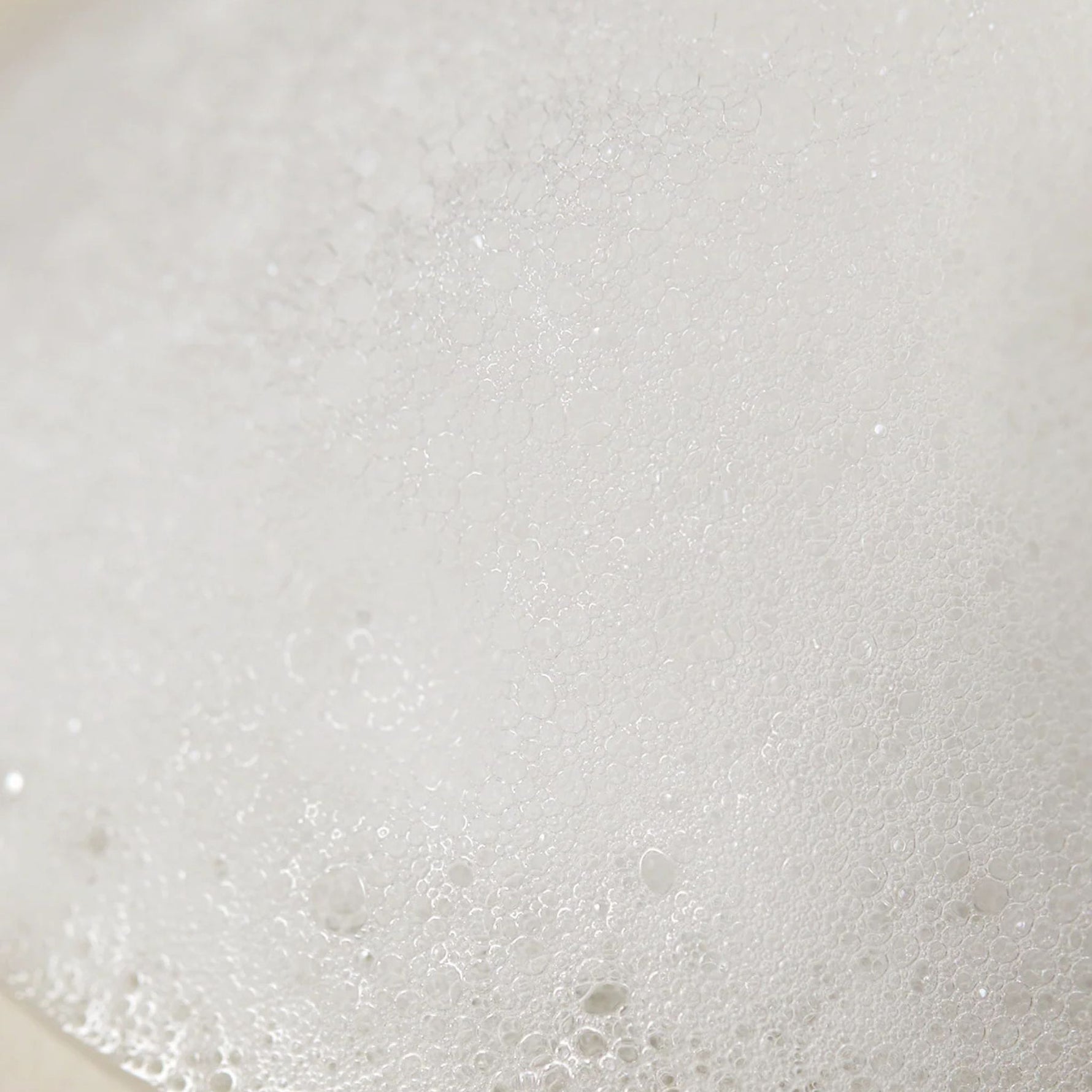 Foamy lather texture of AXIS-Y Sunday Morning Refreshing Cleansing Foam – creamy micro-bubbles for deep yet gentle cleansing