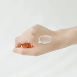 Texture of Beauty of Joseon Apricot Blossom Peeling Gel shown on hand, gentle exfoliating gel for smooth skin