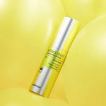 Celimax Retinol Shot Tightening Serum silver bottle on bright yellow background - Korean anti-aging retinol serum