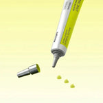 Celimax Retinal Shot Tightening Booster tube with cap off and small drops of lightweight retinal booster dispensing