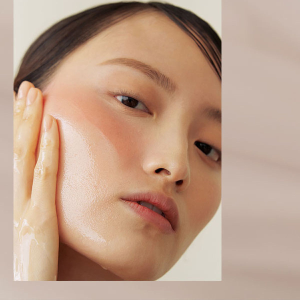 Close-up of skin being cleansed with Klairs Gentle Black Deep Cleansing Oil, showing smooth and hydrated results