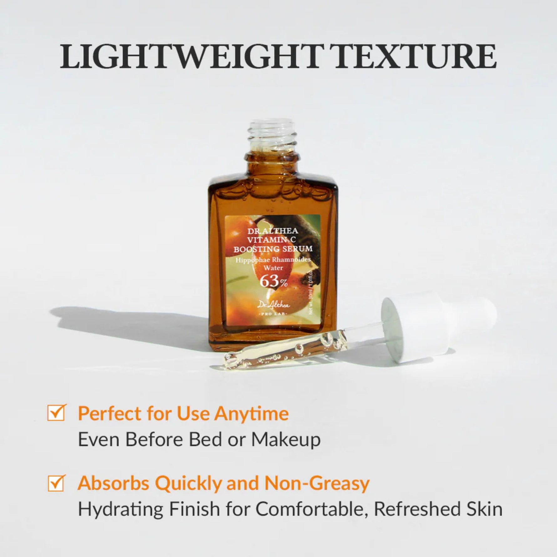 Open bottle of Dr. Althea Vitamin C Boosting Serum with glass dropper, highlighting lightweight texture that absorbs quickly, non-greasy hydrating formula suitable for daily use before makeup or bedtime.