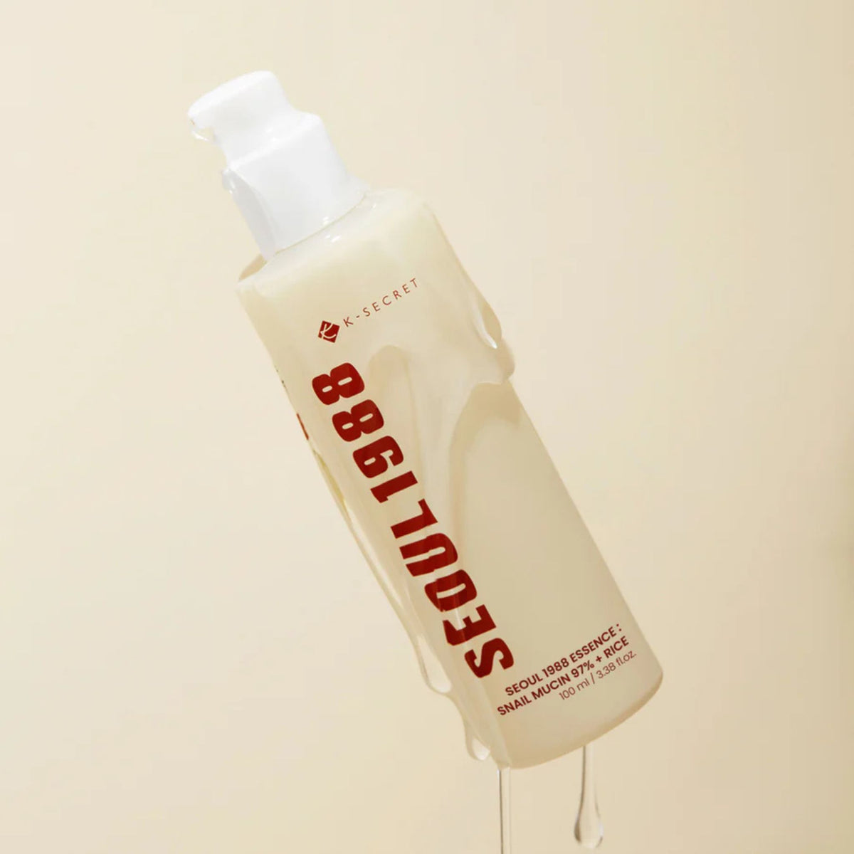 K-SECRET Seoul 1988 Essence Snail Mucin 97% + Rice – hydrating and repairing Korean essence dripping from bottle