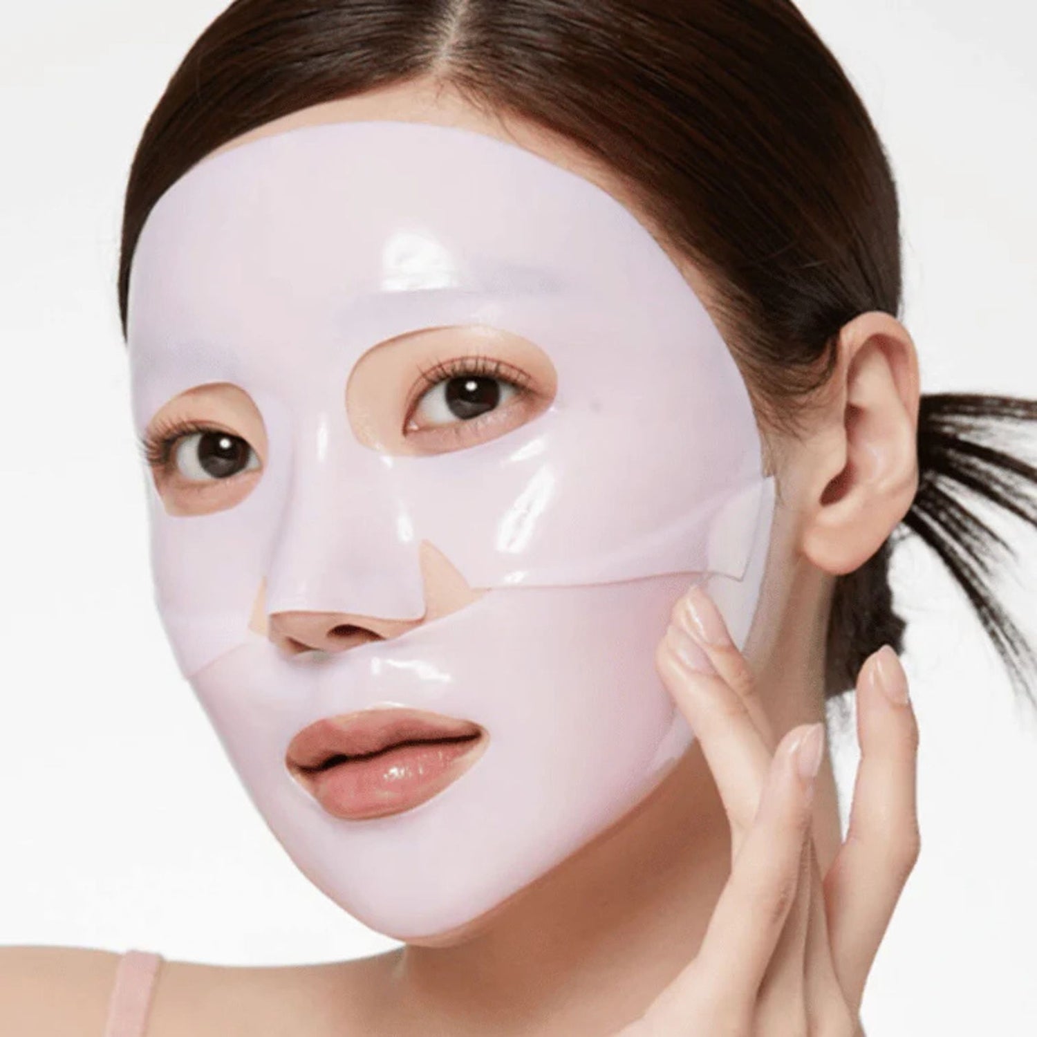 Woman wearing Medicube PDRN Pink Collagen Gel Mask Korean collagen sheet mask skincare treatment