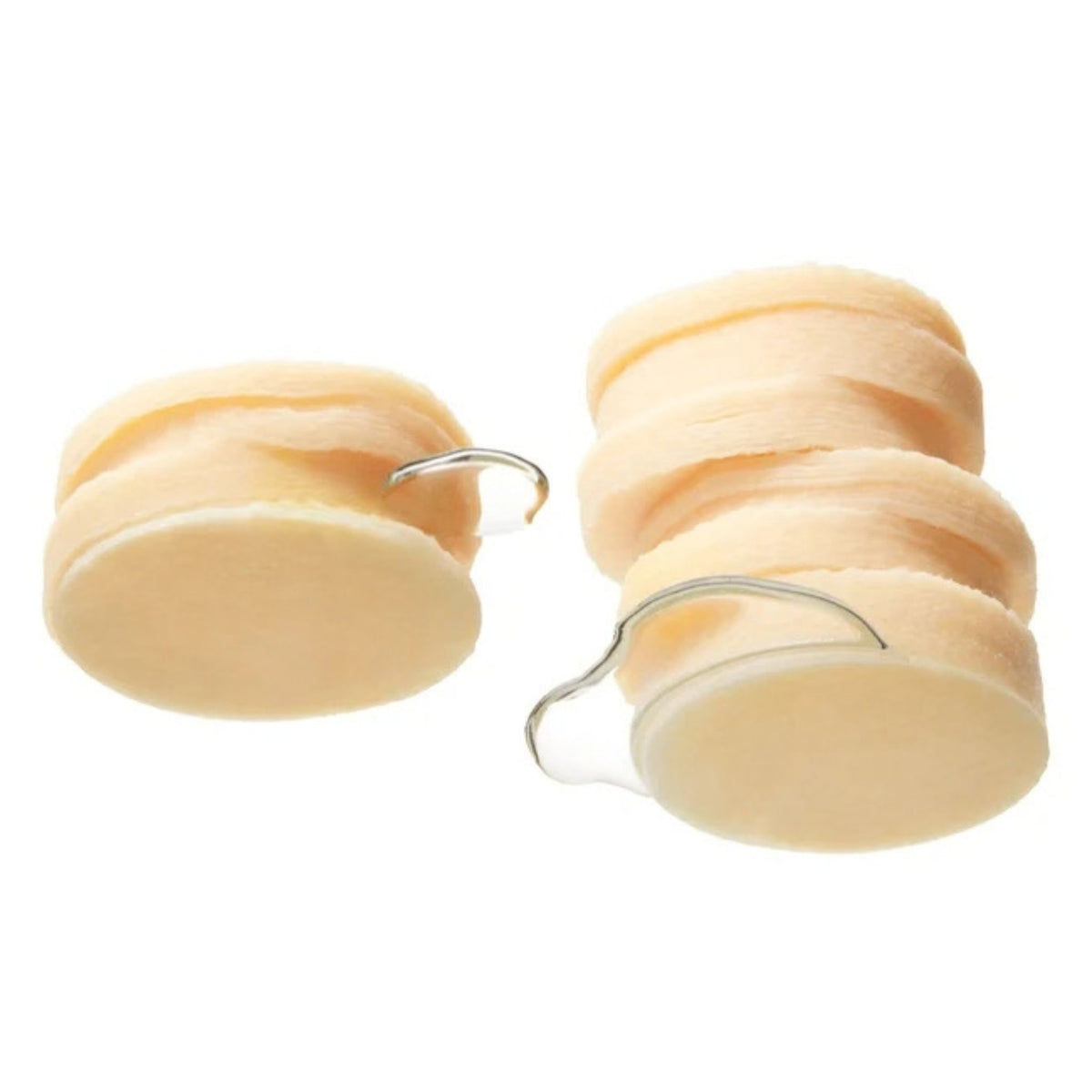 Close-up of stacked Medicube Kojic Acid Turmeric toner pads showing soft textured pad surface
