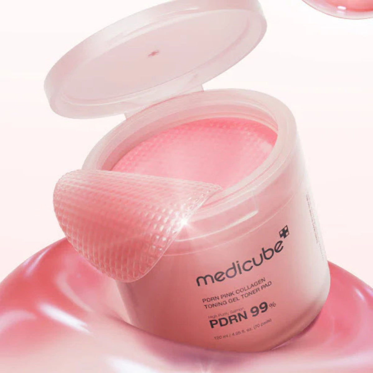 Medicube collagen toner pad texture infused with PDRN niacinamide retinol and hydrating ingredients for radiant skin