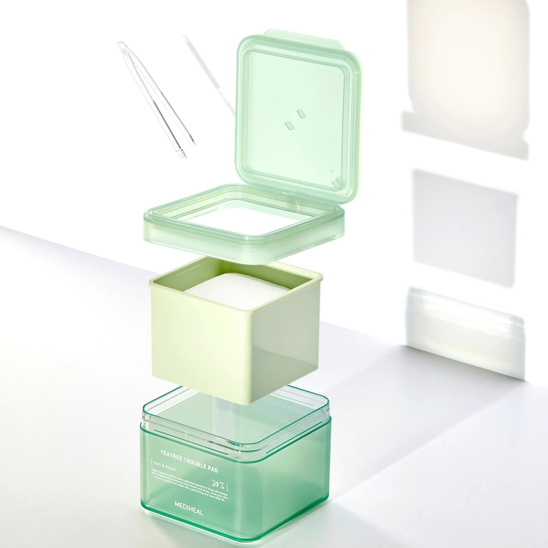 Mediheal Tea Tree Trouble Pad — clean and convenient skincare pad design with hygienic container and tweezers