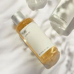 Mixsoon Mung Bean Seed Essence – soothing and purifying Korean essence bottle lying under soft sunlight