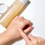 Numbuzin No.3 Super Glowing Essence Toner – watery, essence-like texture applied on hand for radiant hydration