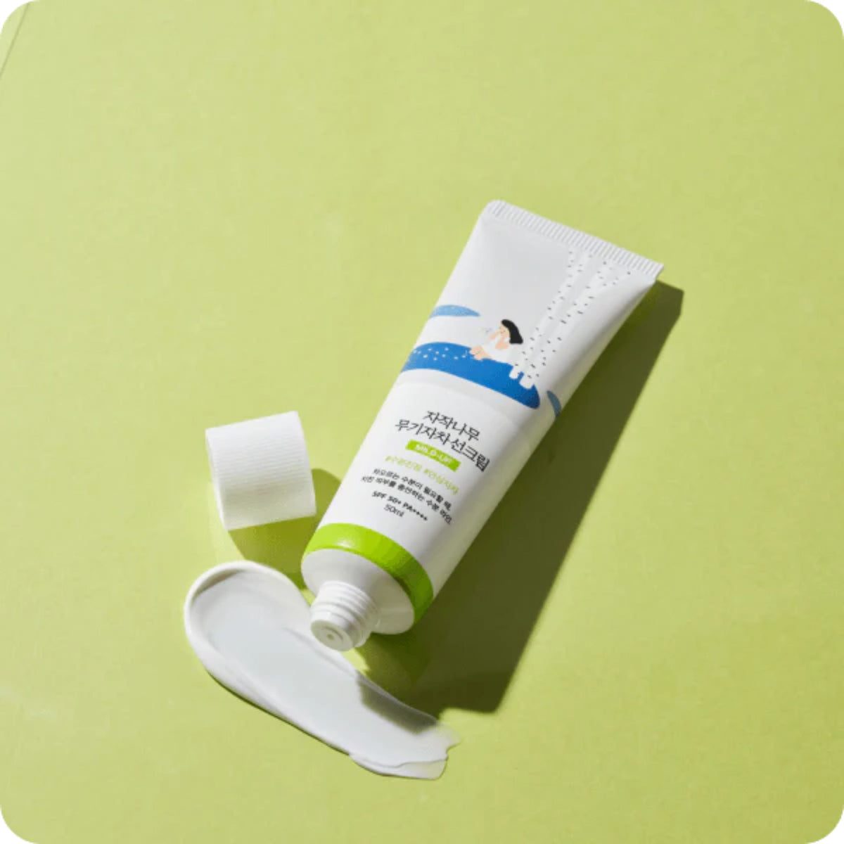 Round Lab Birch Juice Moisturizing Mild Up Sunscreen texture — smooth mineral sun cream with birch sap for calm, hydrated skin