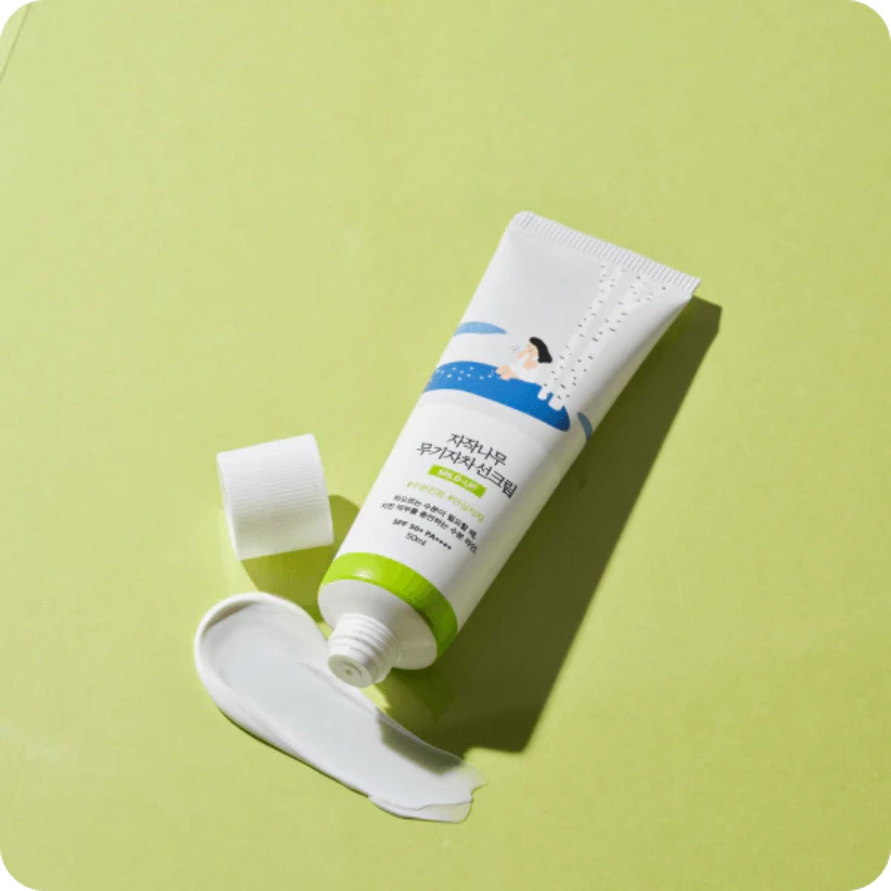 Round Lab Birch Juice Moisturizing Mild Up Sunscreen texture — smooth mineral sun cream with birch sap for calm, hydrated skin