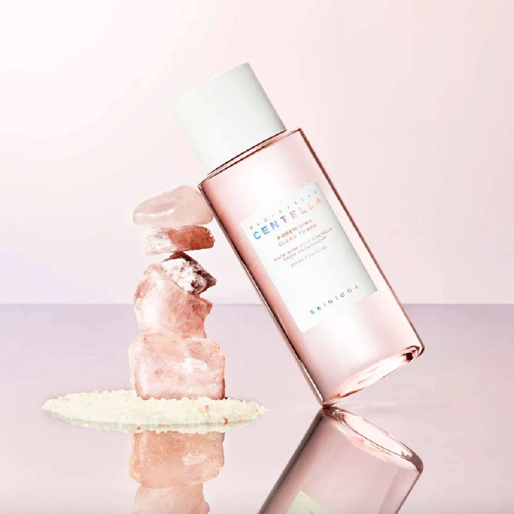Skin1004 Madagascar Centella Poremizing Clear Toner aesthetic shot with pink crystals