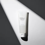 Skin1004 Madagascar Centella Tone Brightening Cleansing Gel Foam 125ml – brightening face cleanser with Centella Asiatica, Korean skincare product on minimal background