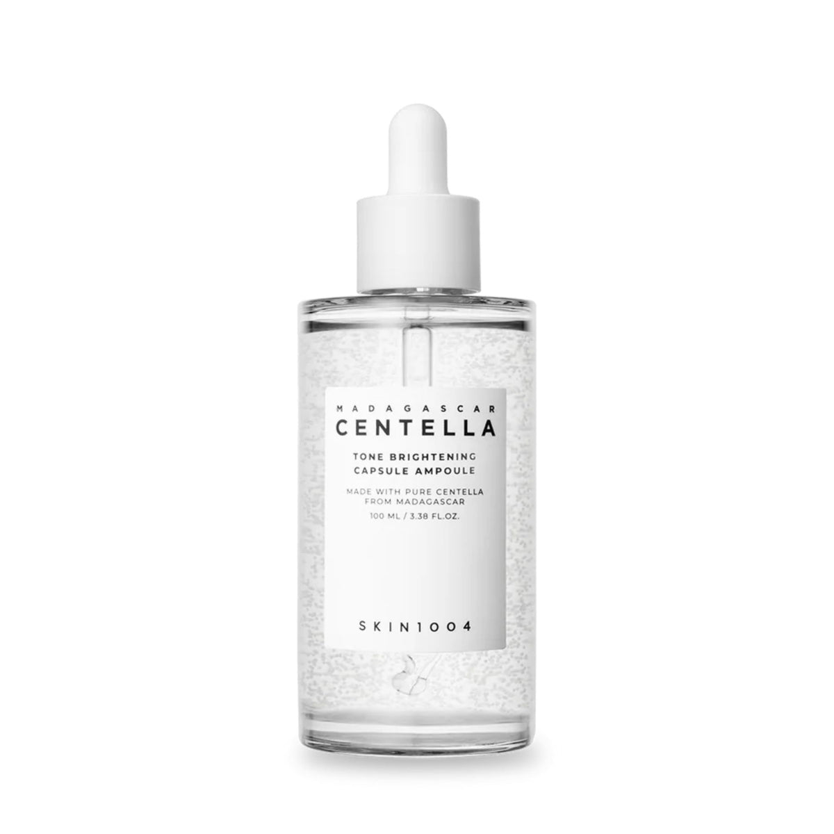 Skin1004 Madagascar Centella Tone Brightening Capsule Ampoule 100ml close-up with micro-capsules for radiant and even skin tone