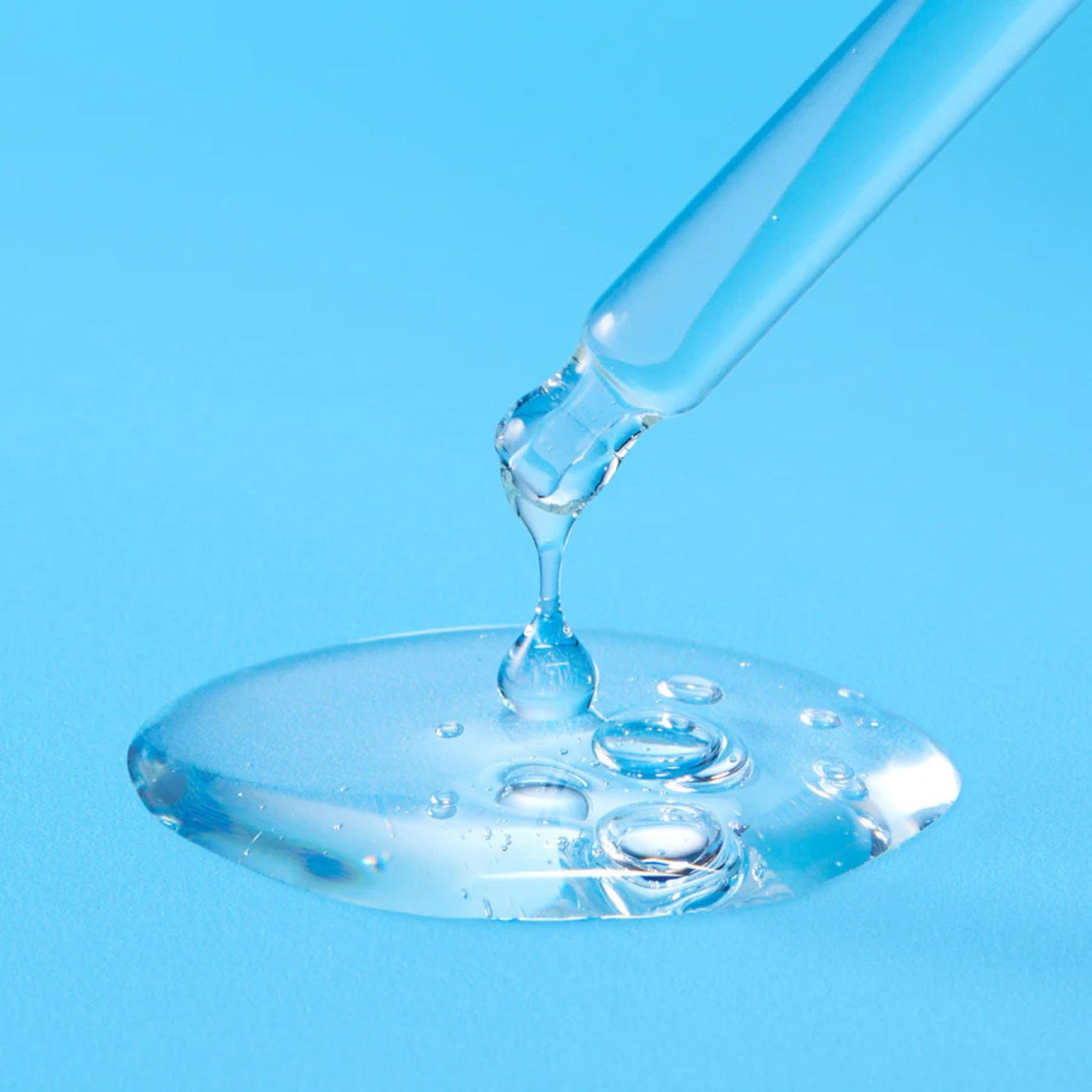 Torriden Dive-In Serum texture — clear hydrating formula with low molecular hyaluronic acid