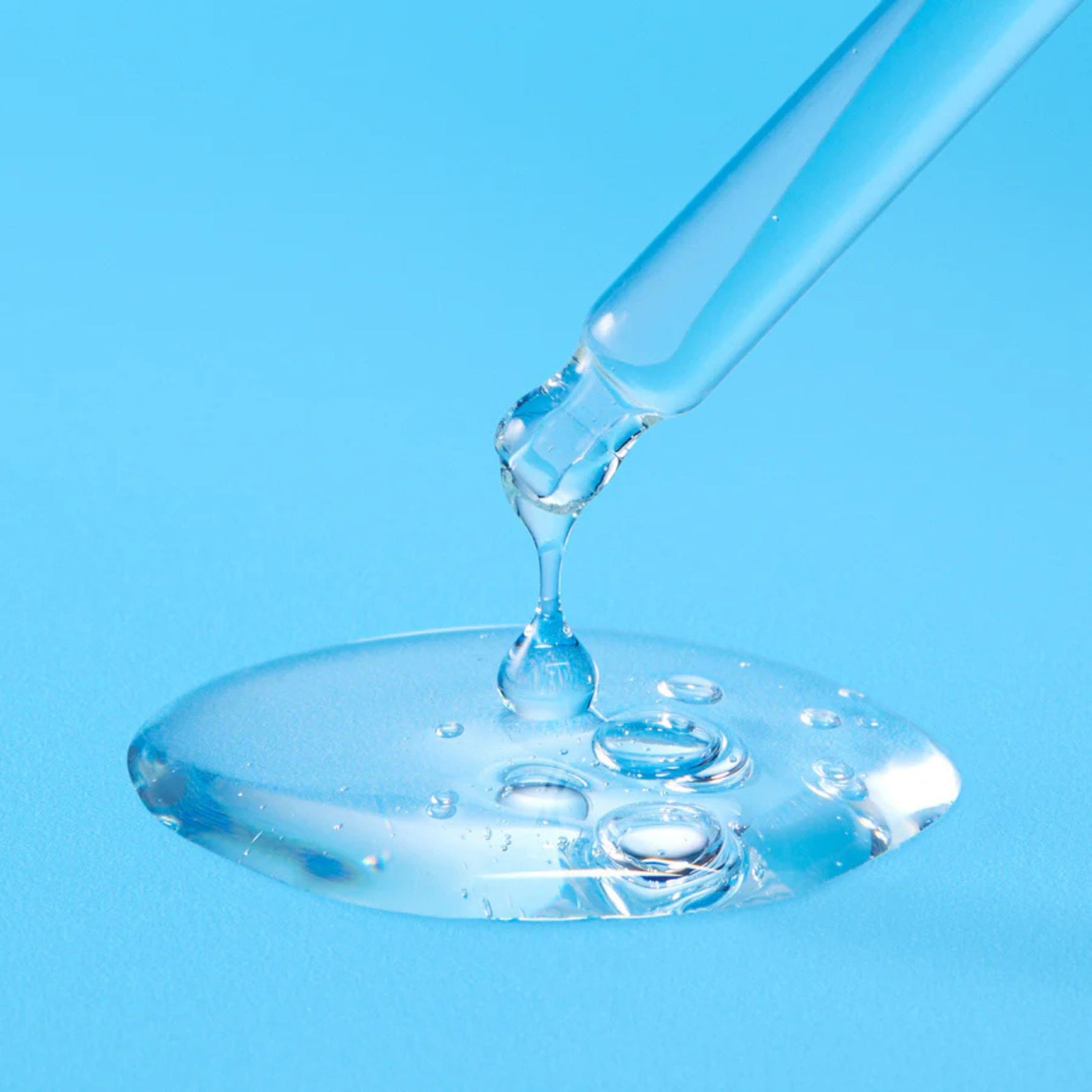 Torriden Dive-In Serum texture — clear hydrating formula with low molecular hyaluronic acid